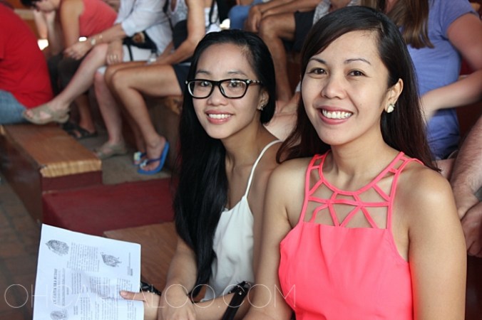 The eager learners. I don't think I've ever seen two people follow so closely a one-page playbill.